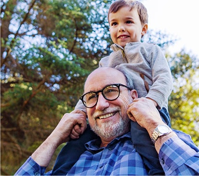 Photo of a satisfied customer with his grandson